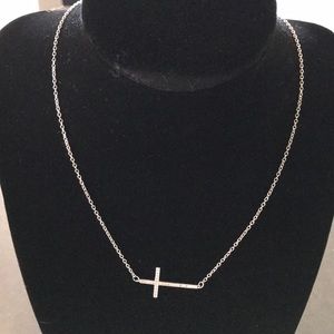 Sterling silver CZ sideways cross necklace